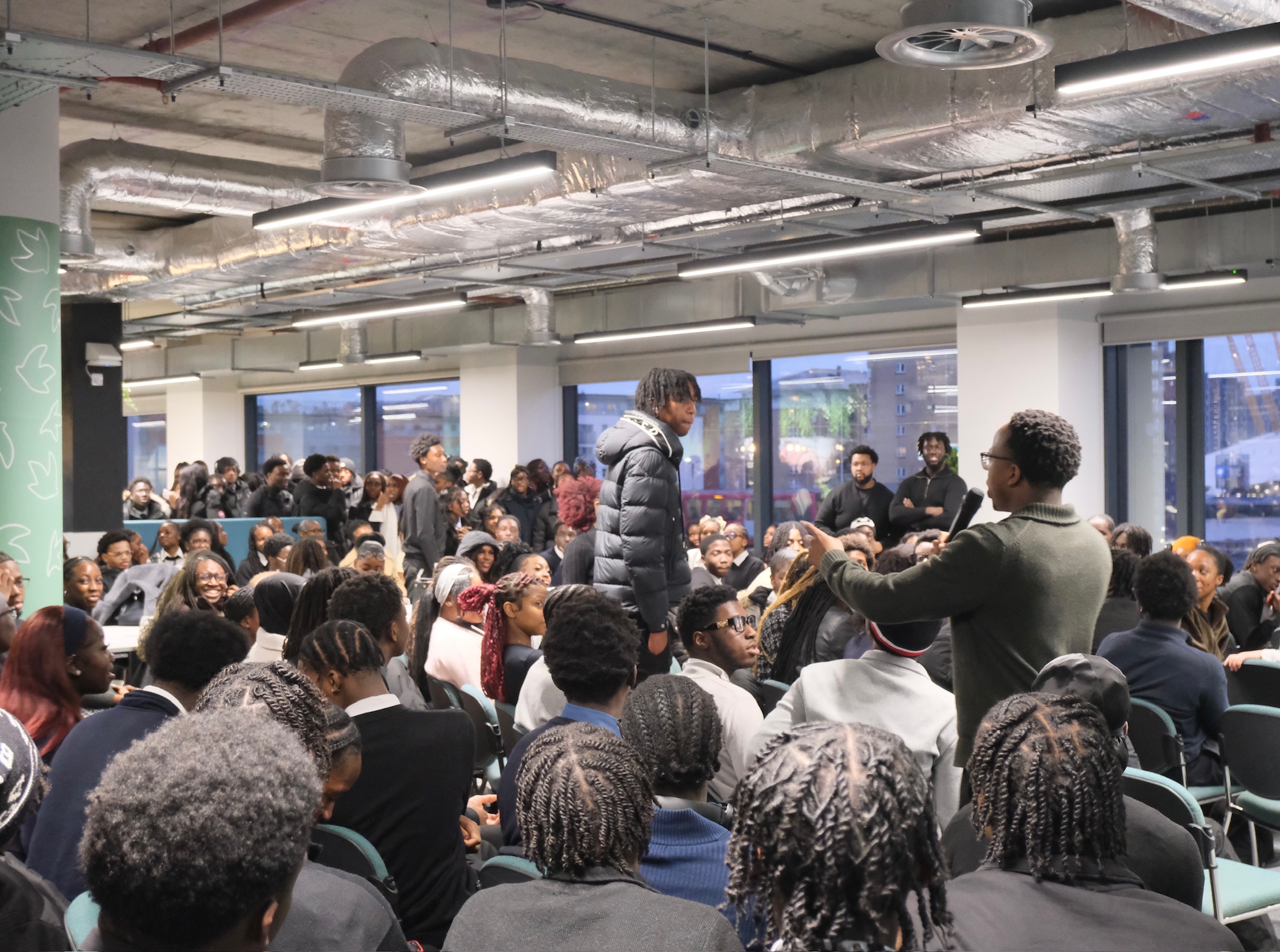 Chinonso presenting a keynote to students